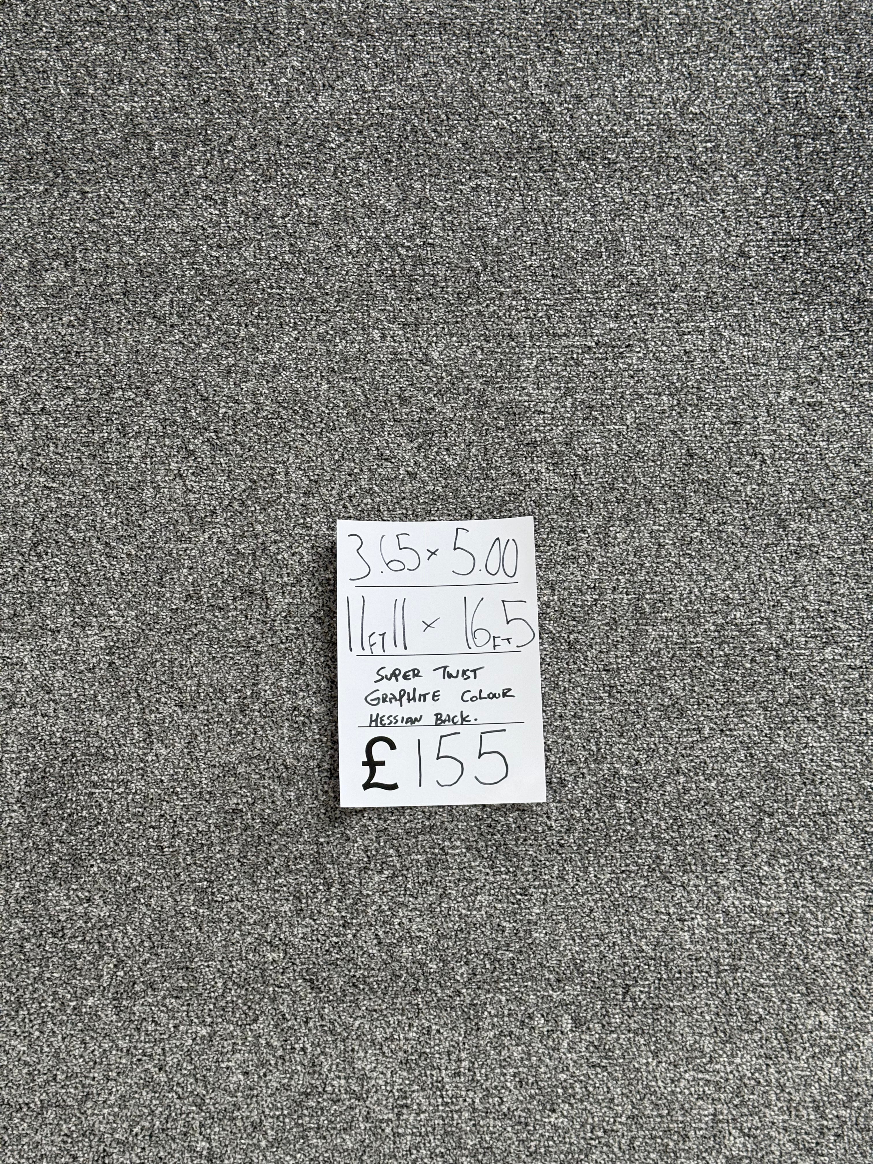 Gray textured fabric carpet with a price tag attached